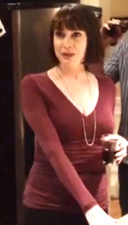 Julie Ann Emery in a skirt